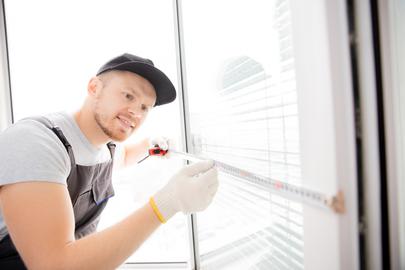 What should you take into account when setting a budget for your vinyl window replacement project?